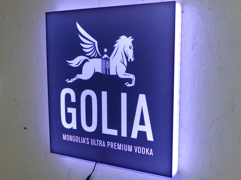Backlit light box cabinet with a printed face, lit evenly across the panel